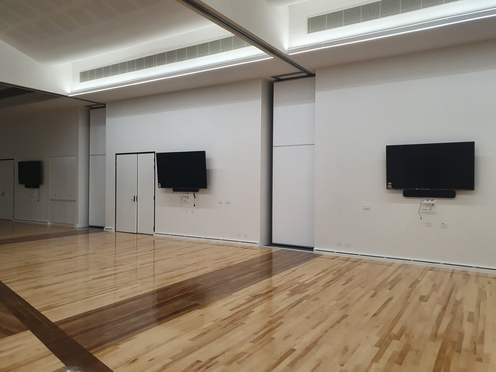 Finished community hall with integrated AV at Hills Hub