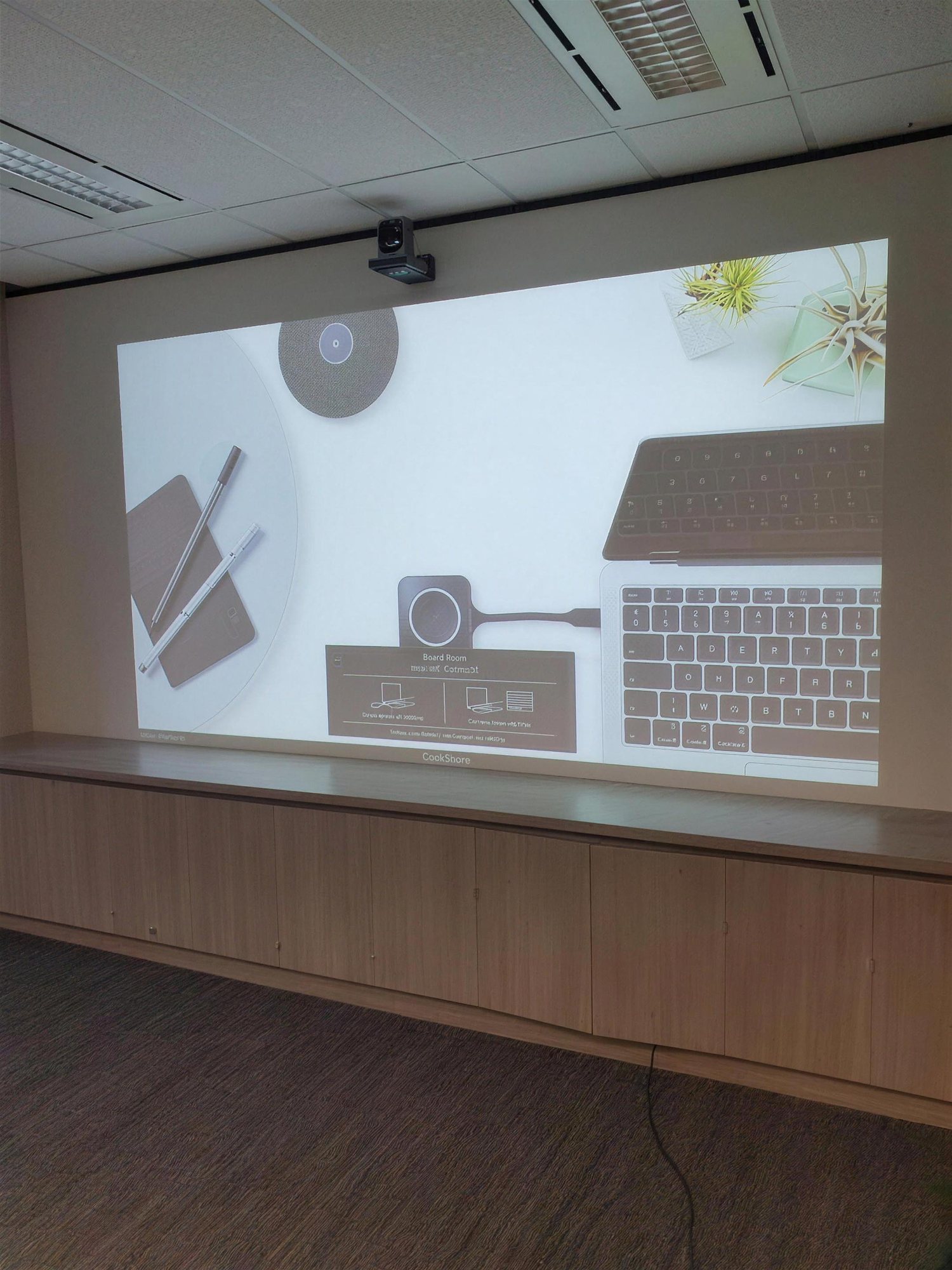 Boardroom with projection screen and integrated AV at 530 Collins Street