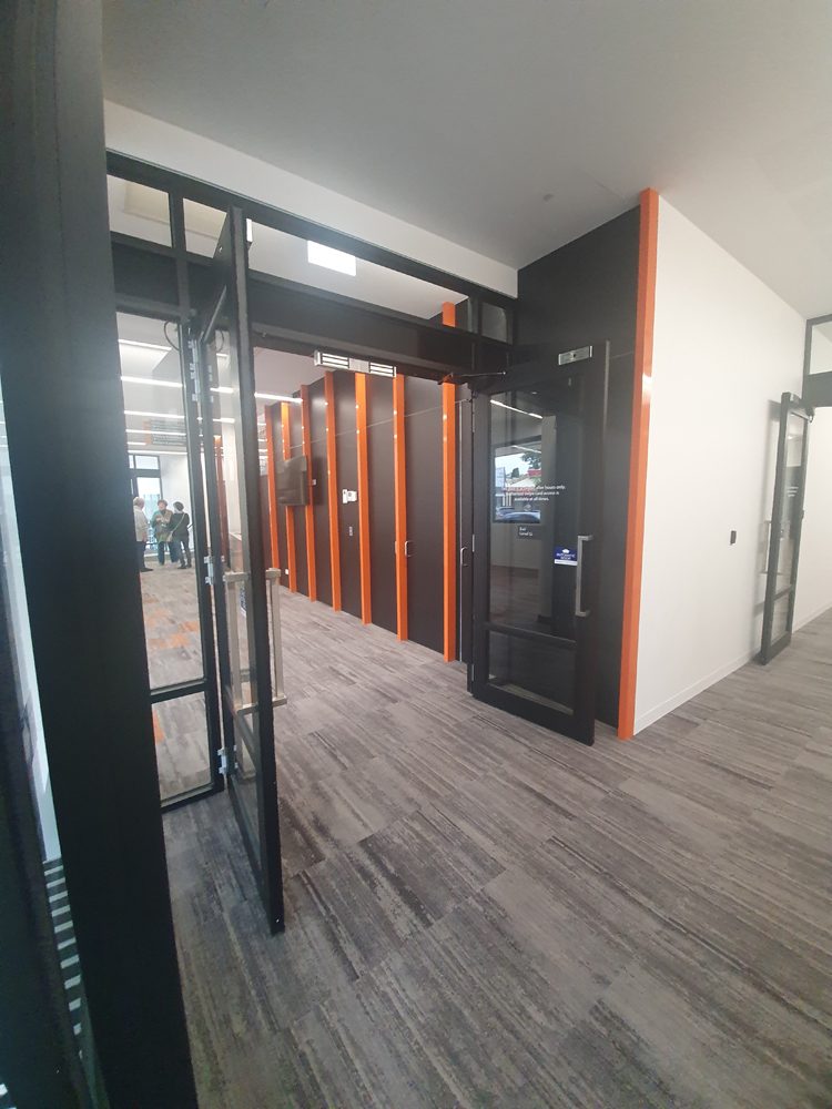 Glazed corridor leading to offices