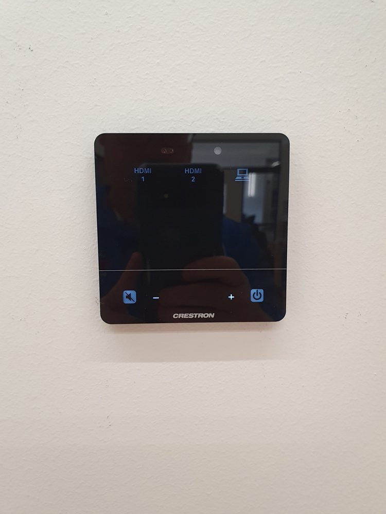 Wall-mounted touch control panel for room audio visual